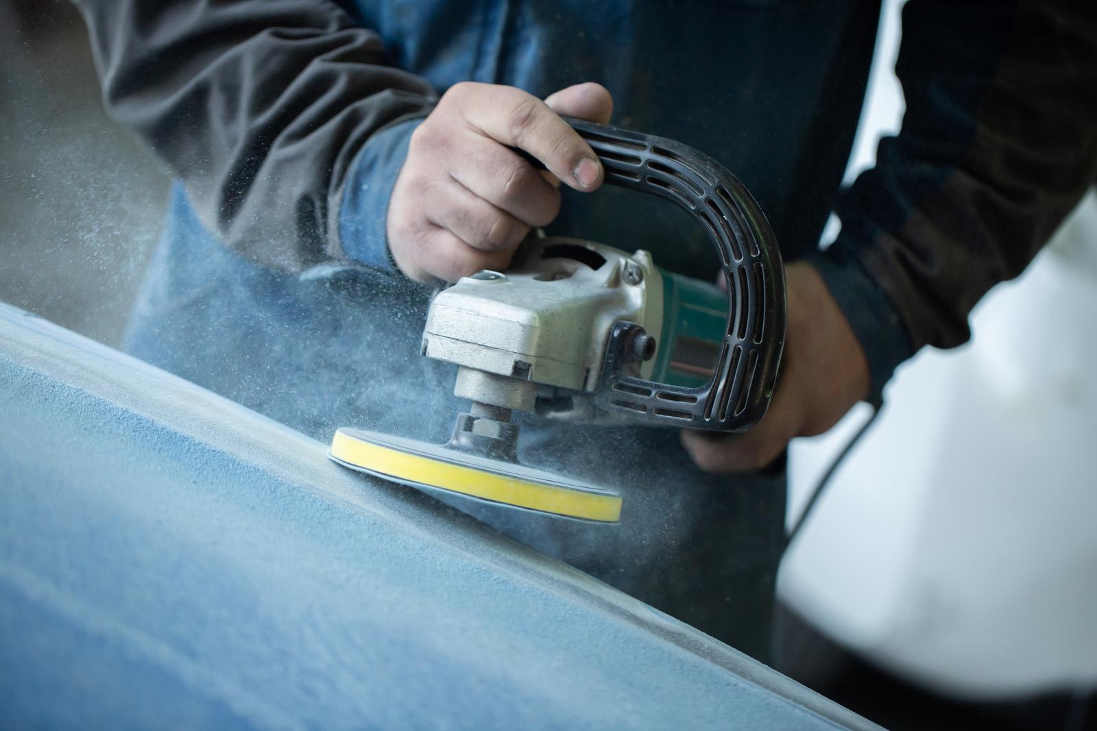 44391018-sanding-polishing-of-the-bumper-on-the-car-at-a-hundred-close-up