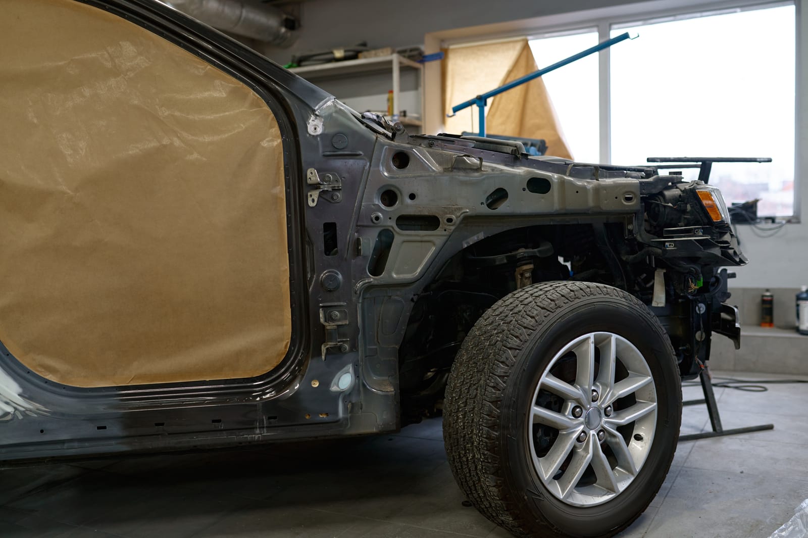 82692536-car-prepared-for-painting-in-body-shop